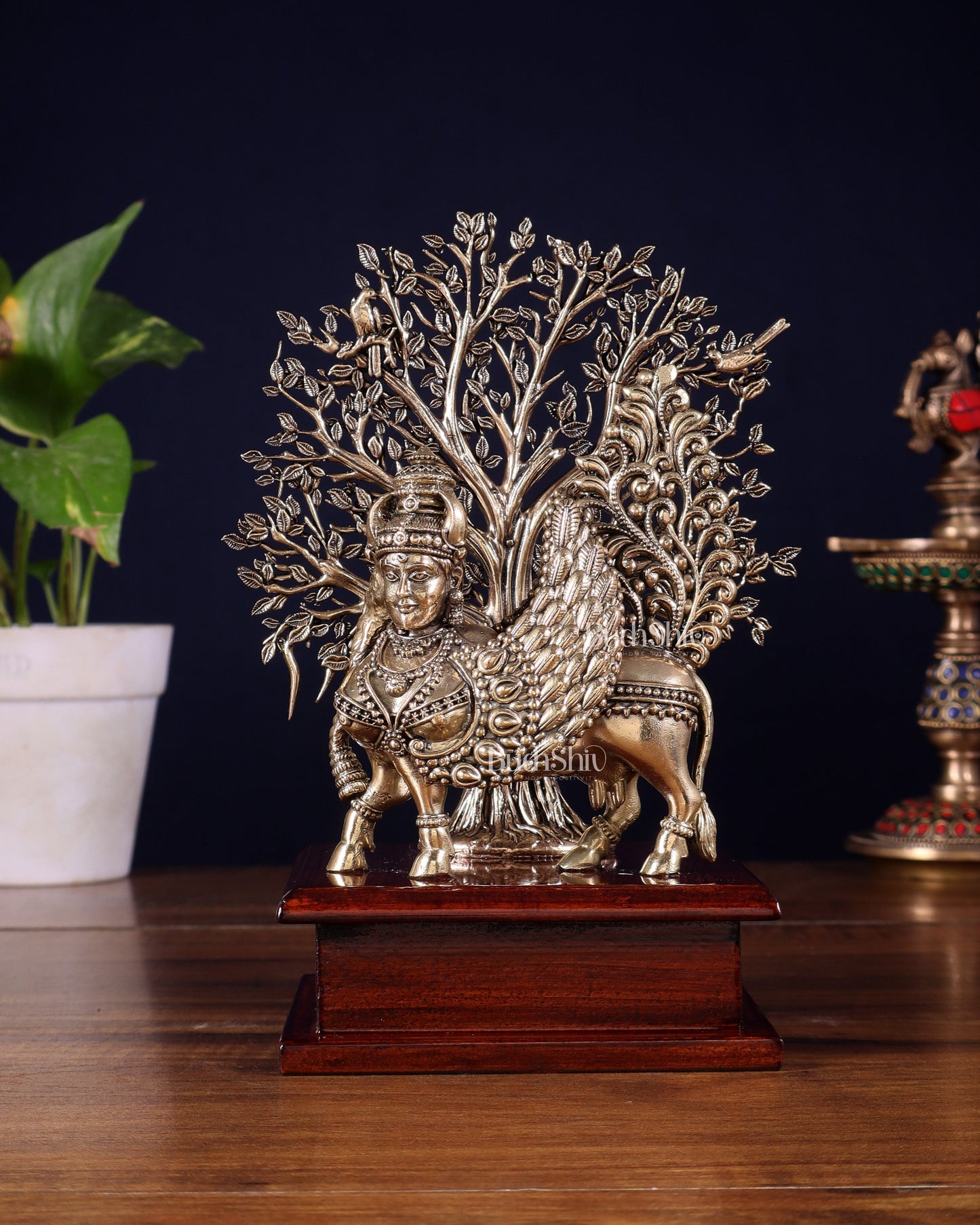Brass Superfine Kamdhenu Cow with Goddess Face under Kalpavriksha tree on Wooden Base â 8 Inch