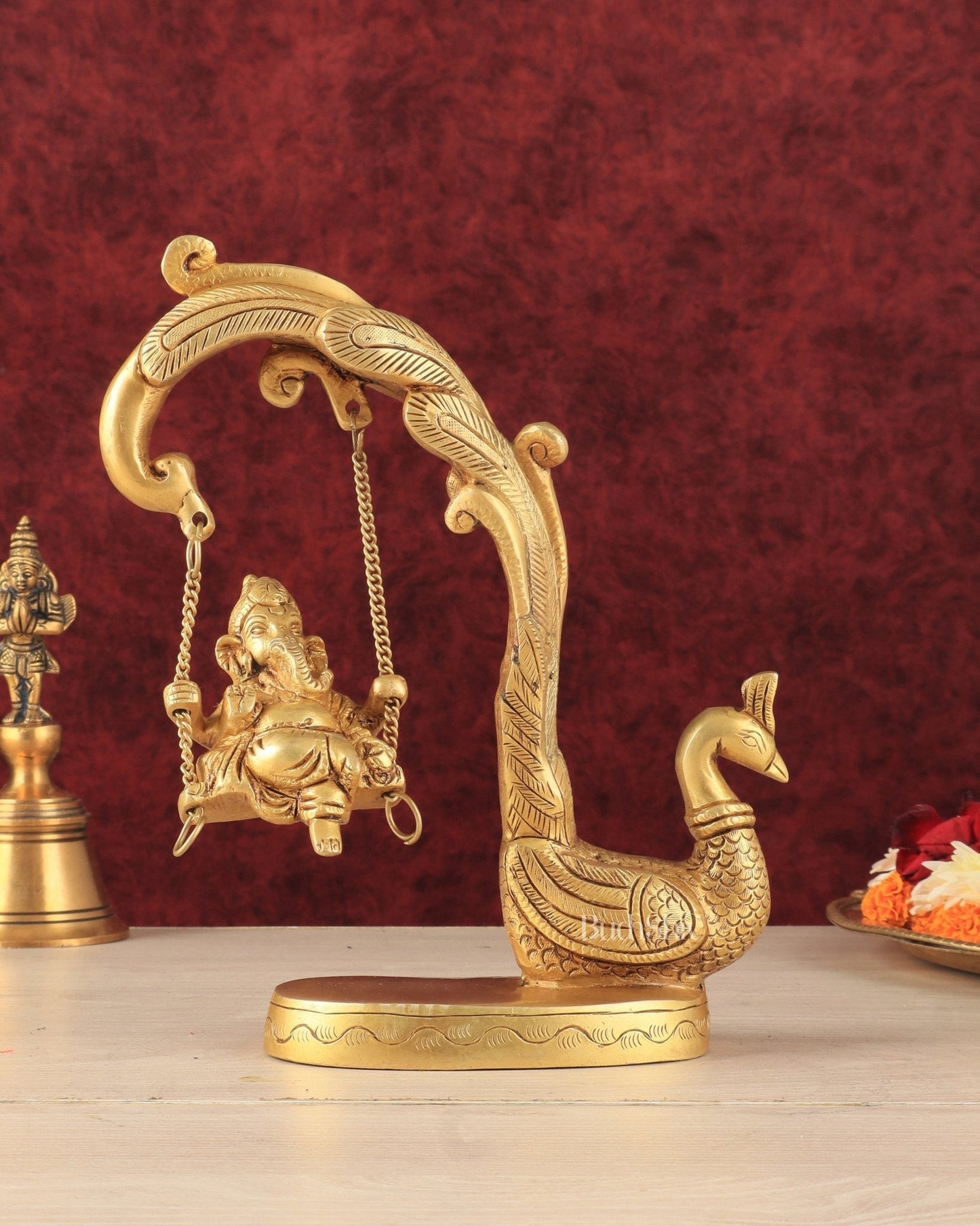 Unique Pure Brass Lord Ganesha on a Peacock Swing Idol - Sama Homes Idol - Brass Sculpture