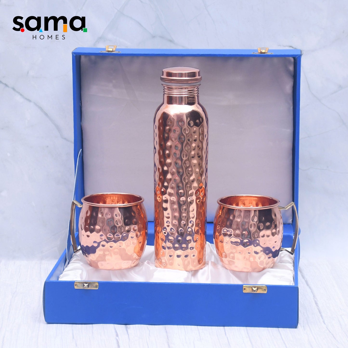Hand Hammered Copper Cocktail Mugs and Ayurvedic Bottle