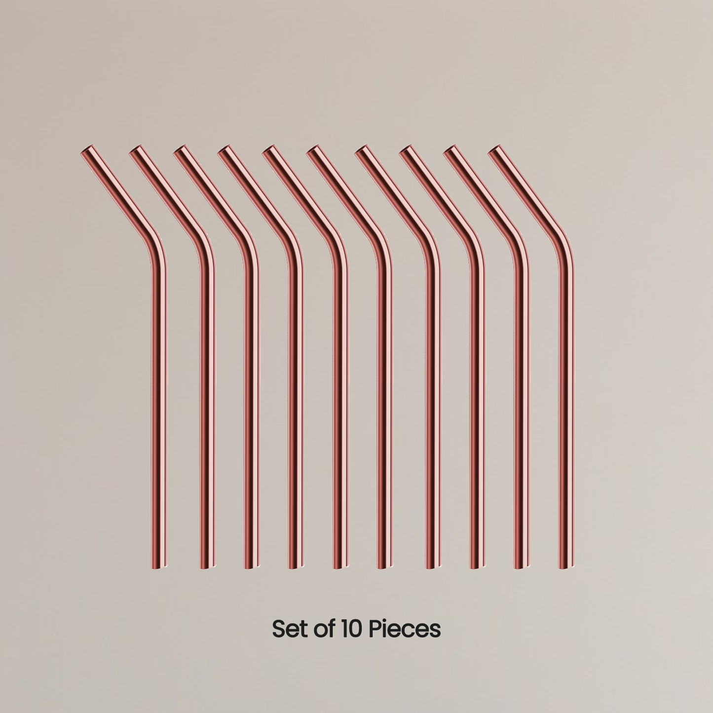 Set of 10 rose gold metal straws on a beige background