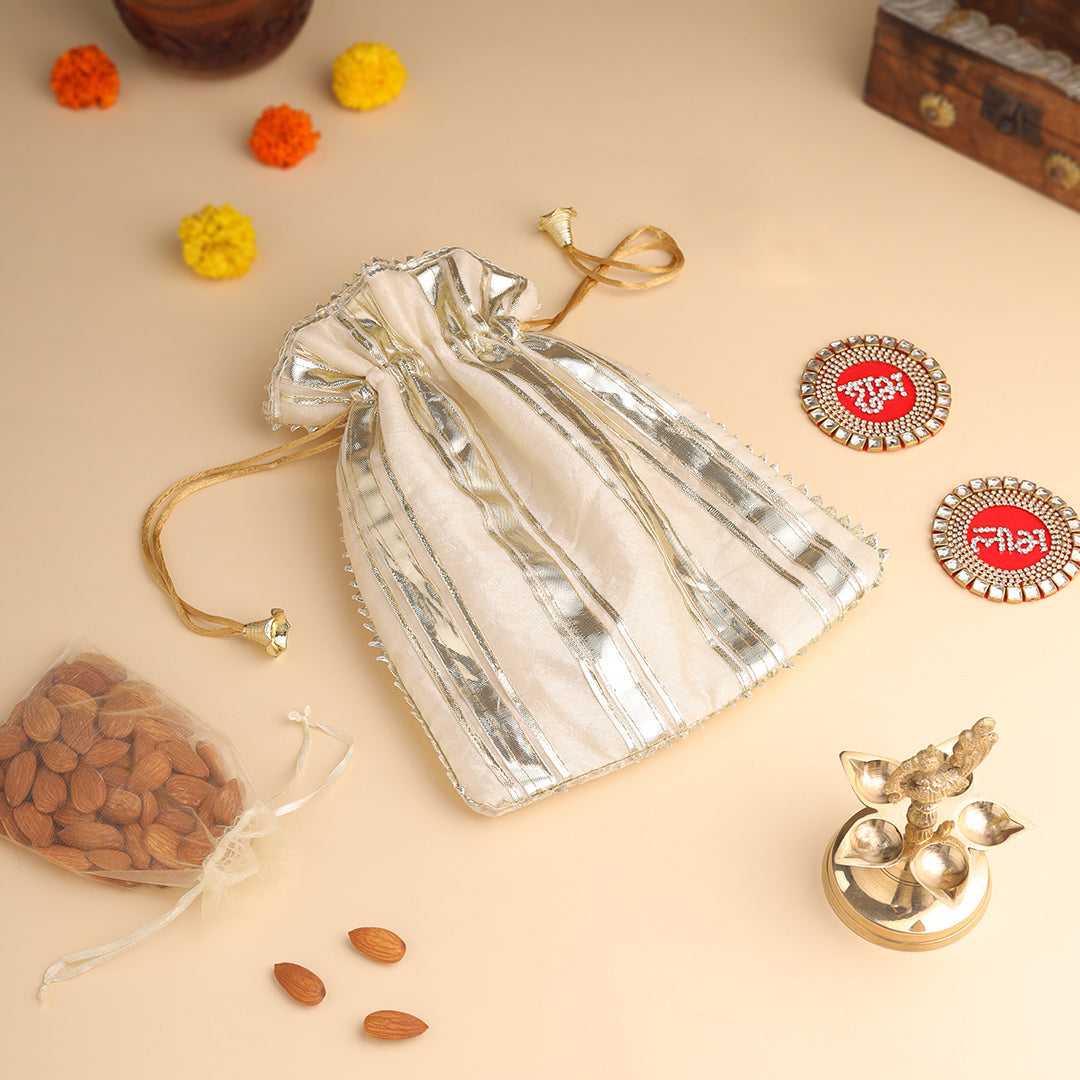 Brass Charan Paduka, Diya & Chowki Gift Festive Potli/Hamper - Image 6