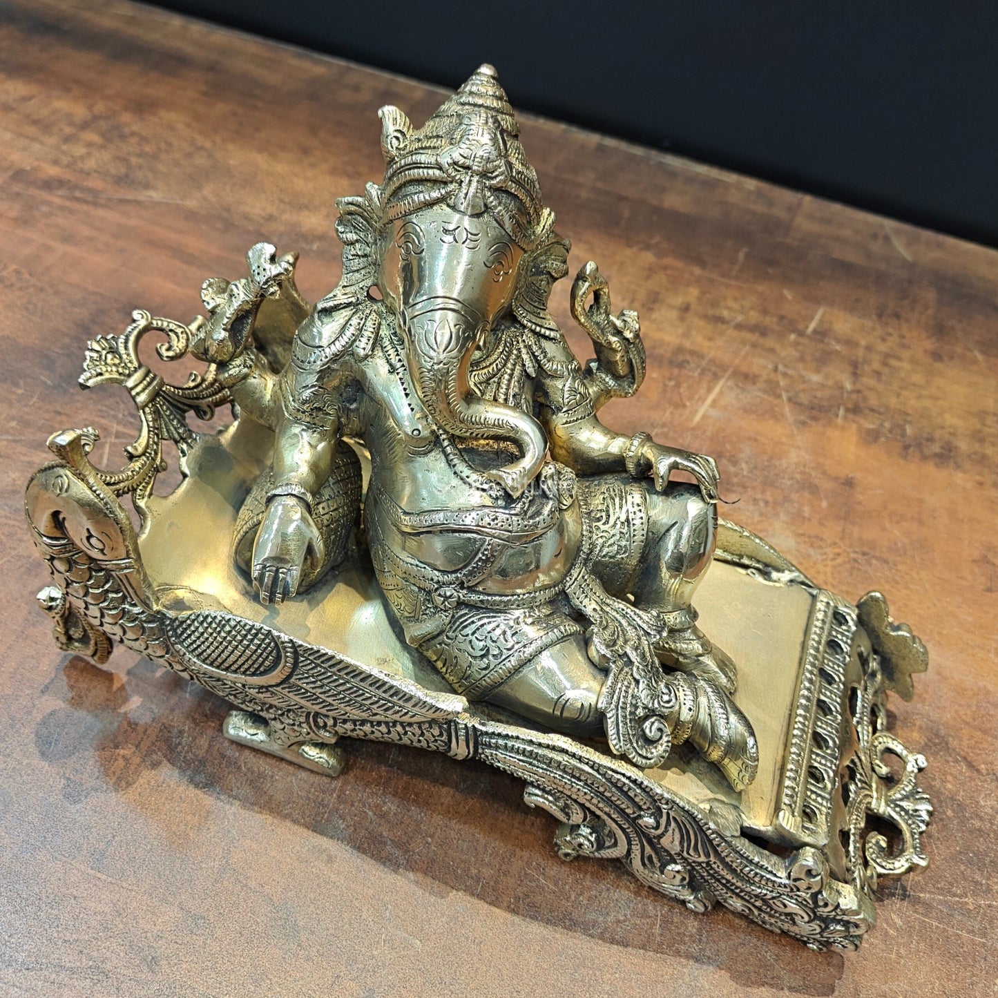 Brass Ganesha Idol Resting On Peacock Singhasan 10 Inch