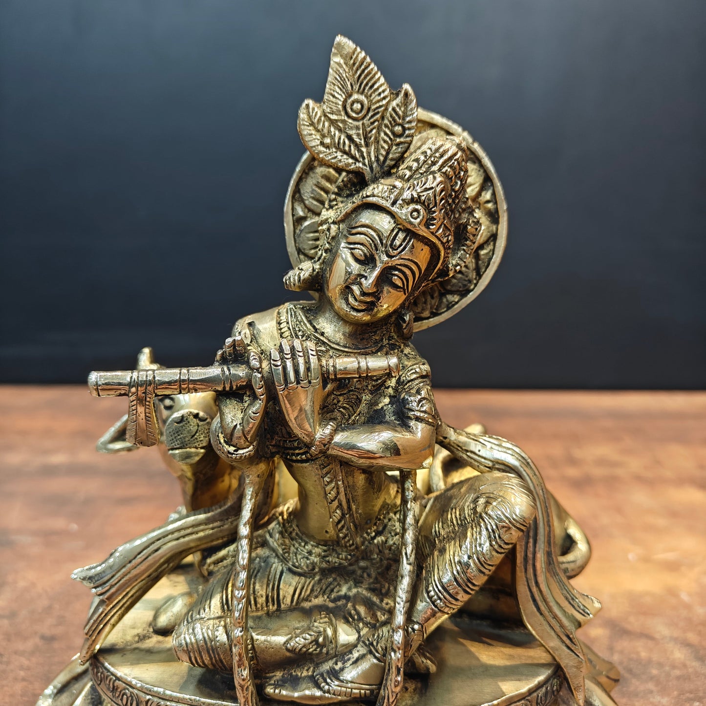 Brass Krishna Idol Seated With Cow On Pedestal 9 Inch
