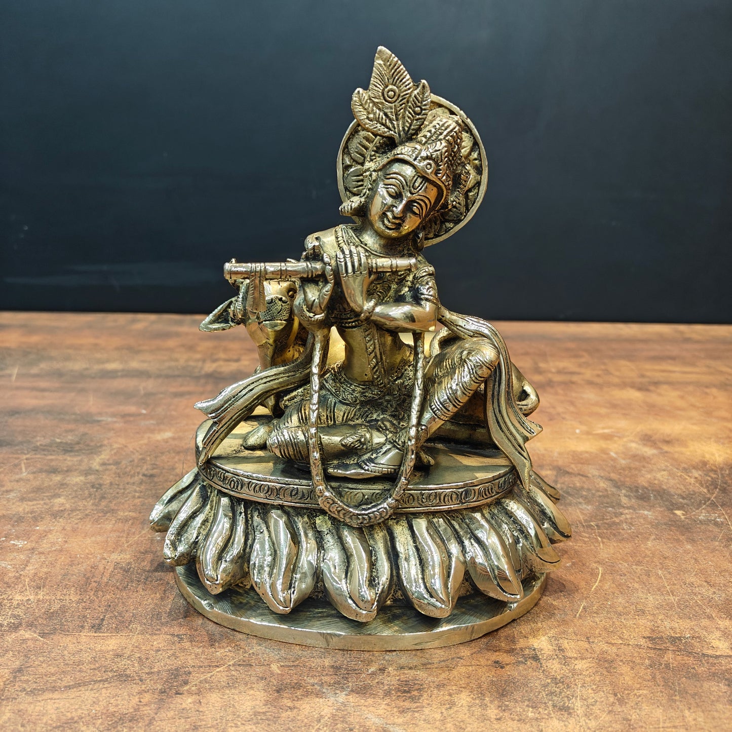 Brass Krishna Idol Seated With Cow On Pedestal 9 Inch