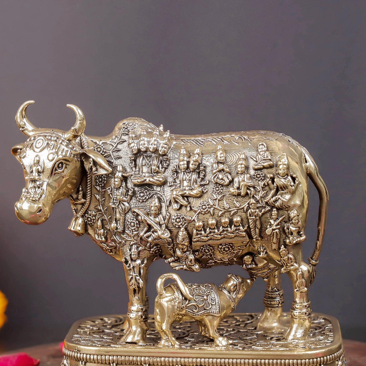 Brass Superfine Kamadhenu Cow with Engraved Gods and Goddesses 4 Inch - Image 2