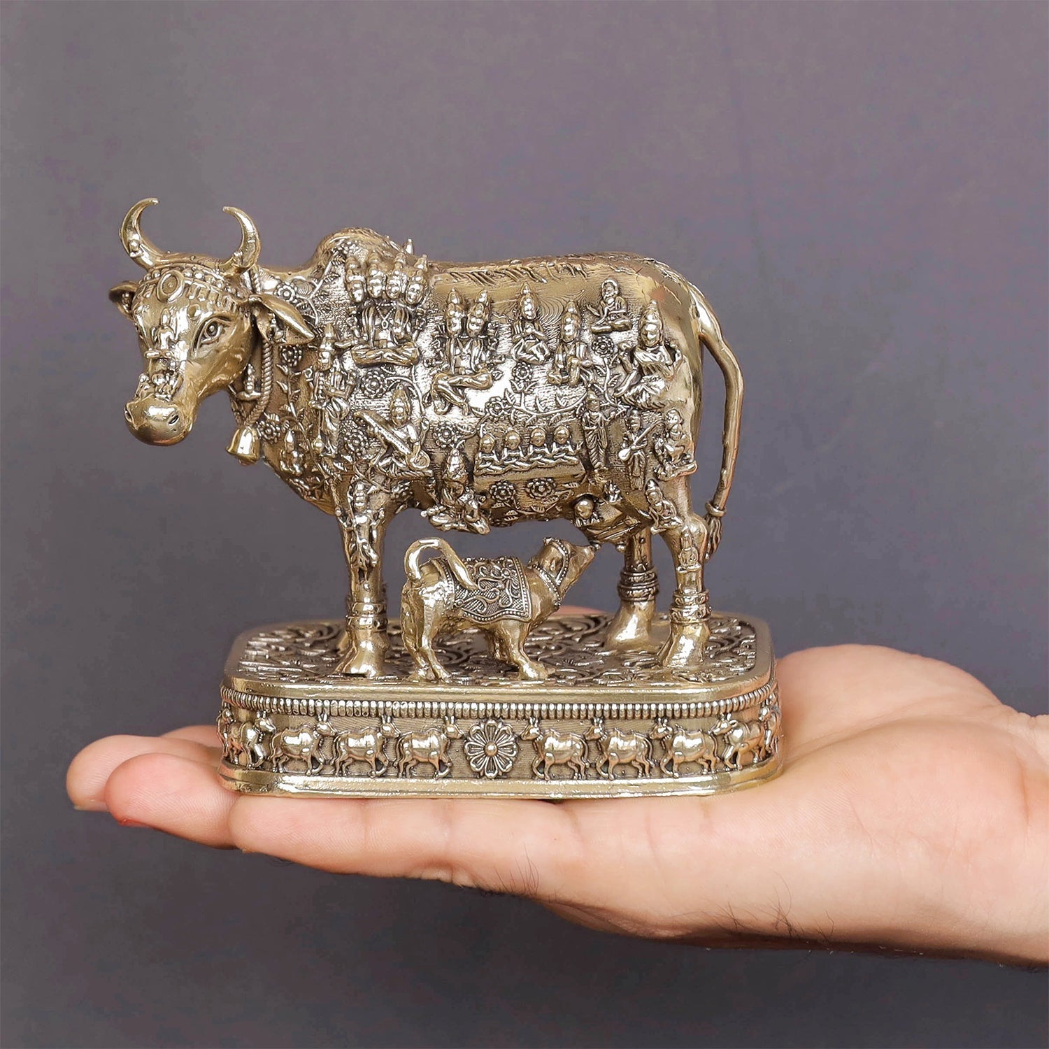 Brass Superfine Kamadhenu Cow with Engraved Gods and Goddesses 4 Inch - Image 3