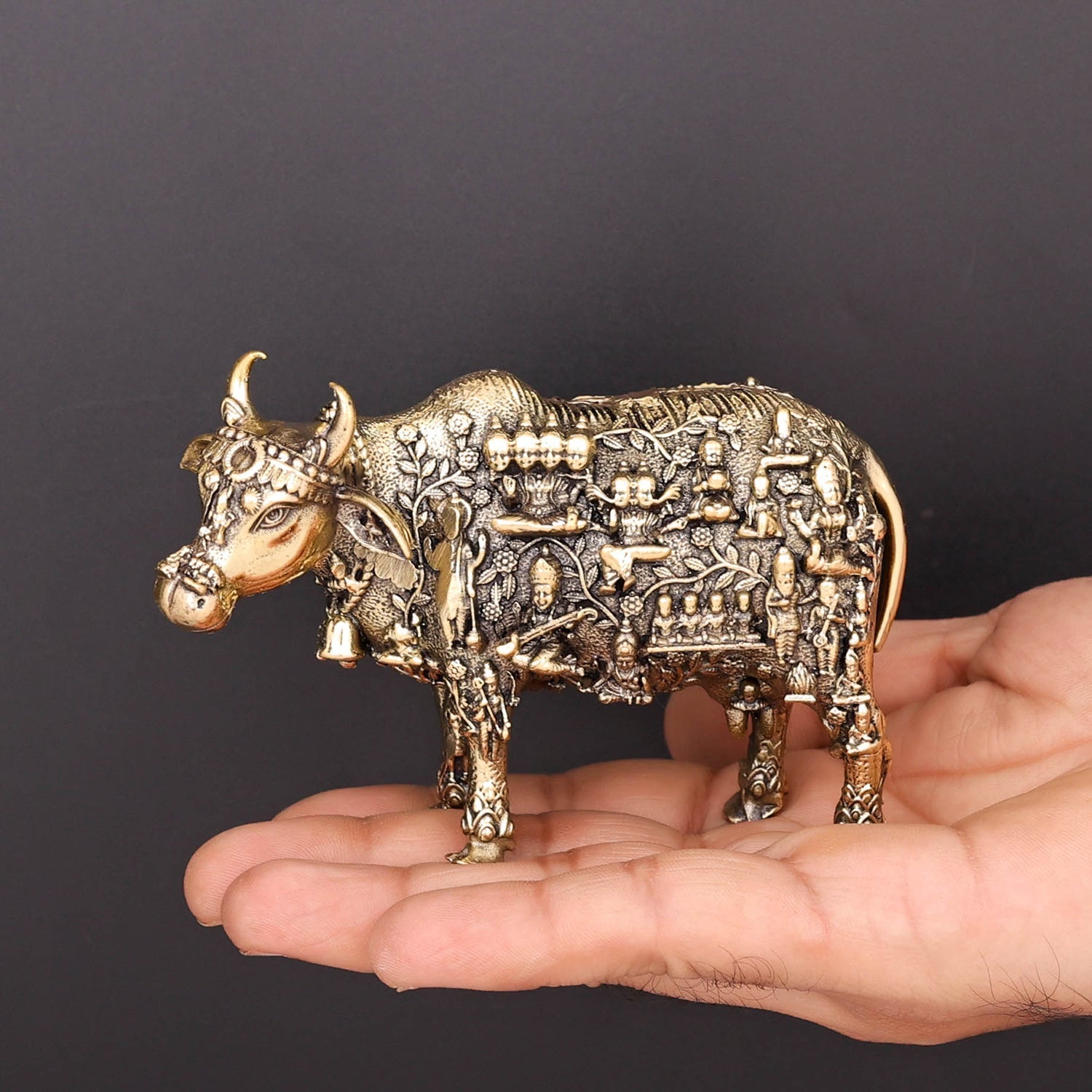 Brass Superfine Kamadhenu Cow with Engraved Gods and Goddesses 4 Inch - Image 3