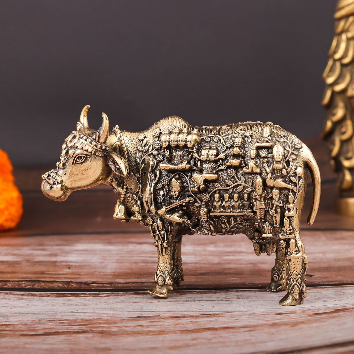 Brass Superfine Kamadhenu Cow with Engraved Gods and Goddesses 4 Inch - Image 4
