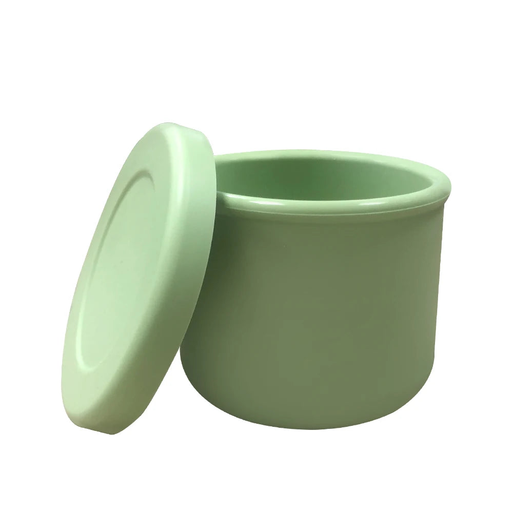 Green storage jar with lid on a white background - Image 4