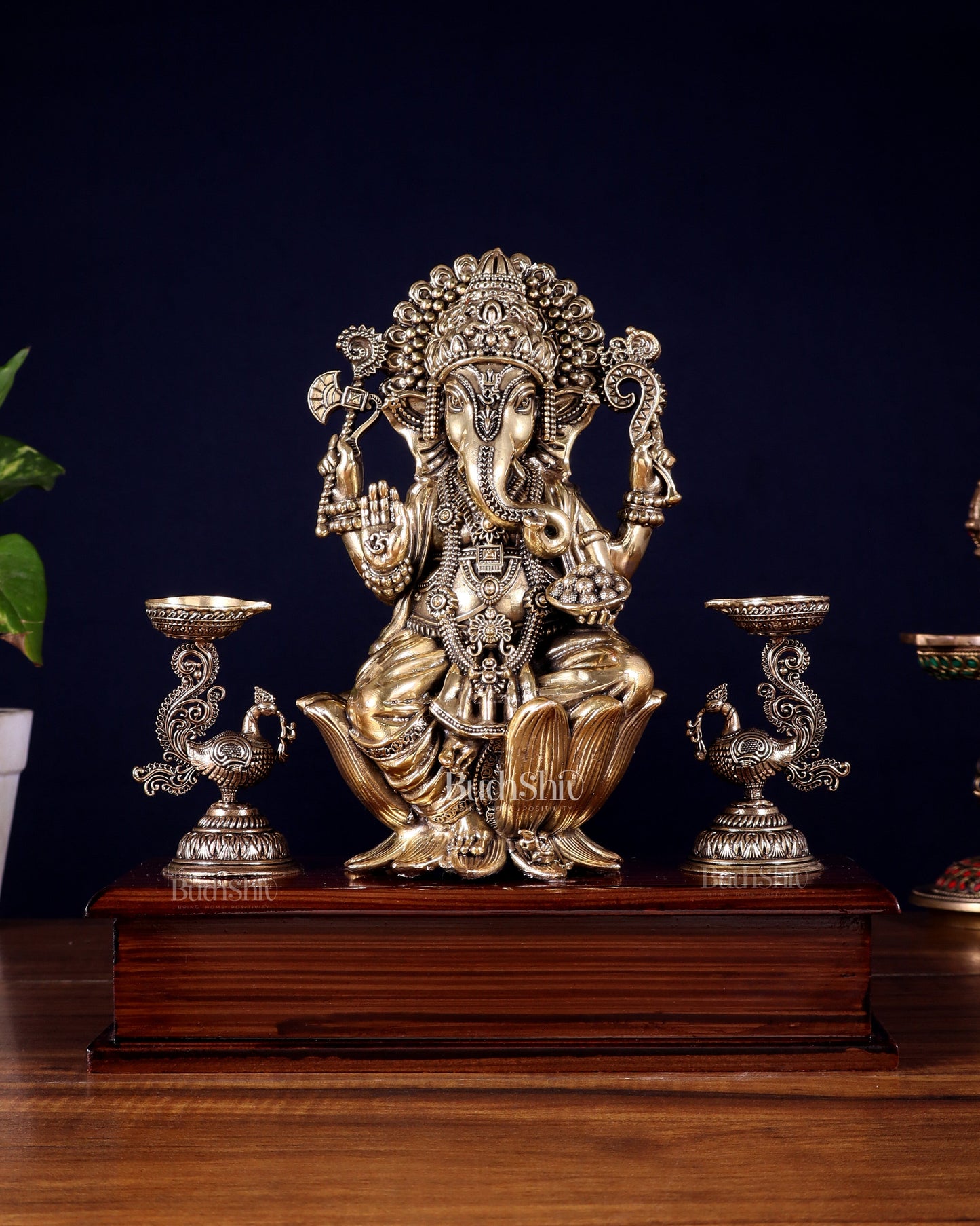 Brass Superfine Lord Ganesha Idol with Twin Peacock Lamps on Wooden Base – 9.5 Inch - Sama Homes Idol - Brass Sculpture