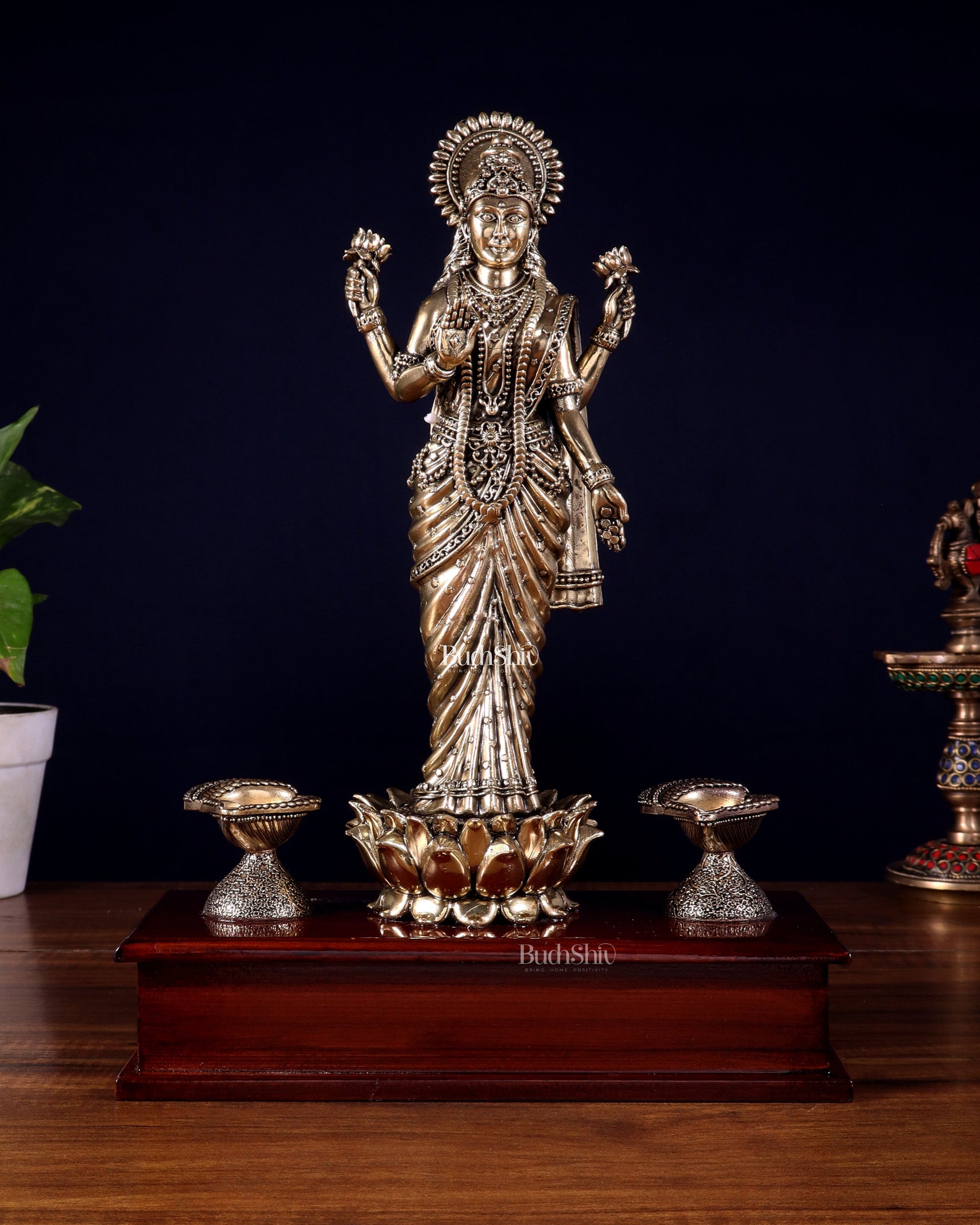 Brass Superfine Goddess Lakshmi Standing on Wooden Base with Diyas – 12.5 Inch - Sama Homes Idol - Brass Sculpture - Eco-friendly - Sama Homes