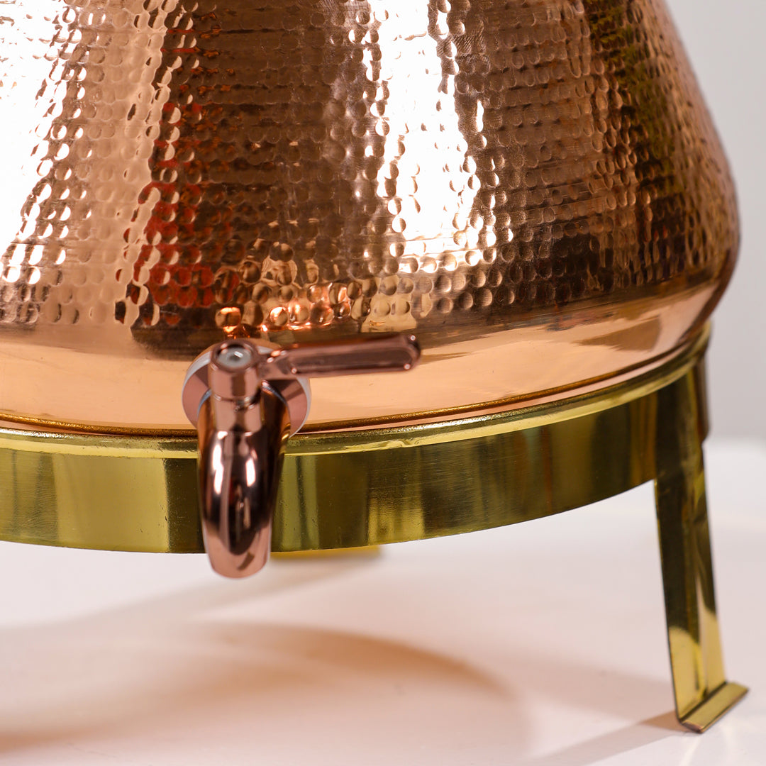 Close-up of a copper and brass container with a spout on a white background - Image 6
