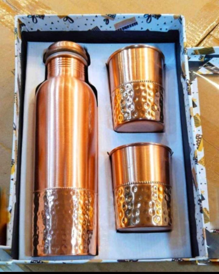Pure copper bottle with matching glasses wellness set
