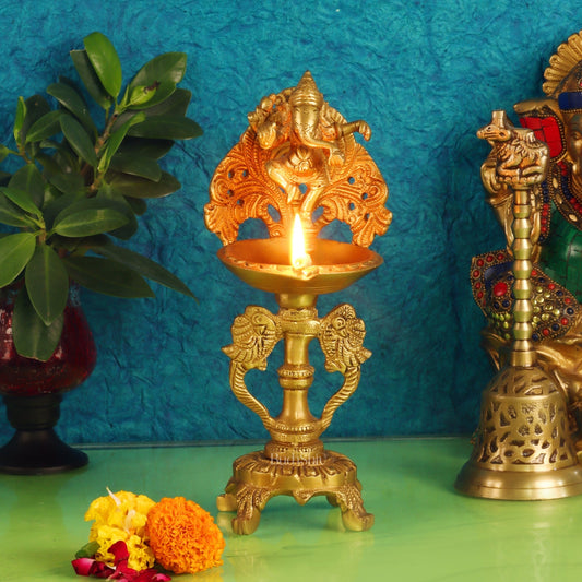 Sama Homes-brass engraved dancing ganesha diya with a stand peacock and floral design 9 inch