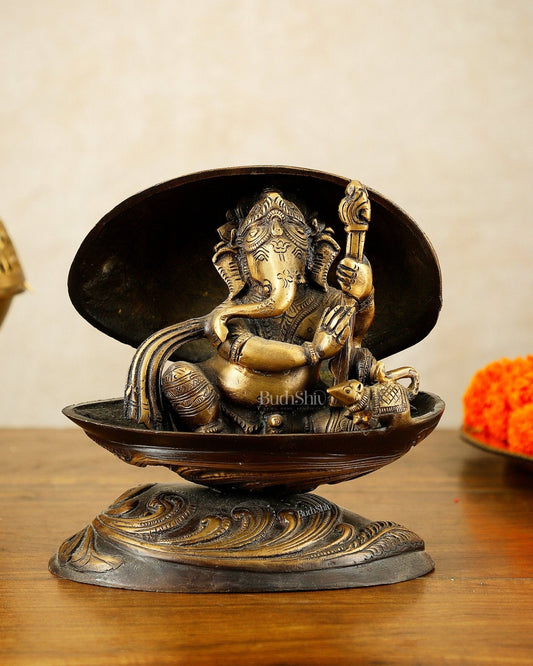 Brass Lord Ganesha Playing Veena Inside Shell – 7” | 100% Certified Copper & Brass - Sama Homes Idol - Brass Sculpture
