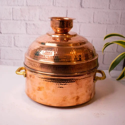 Traditional copper modak patra steamer for ayurvedic cooking