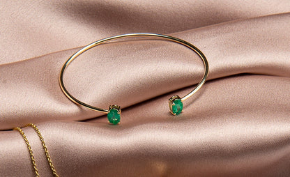 14k yellow gold bangle set with a matching pair oval Cut emerald by SAMAHealing - Gems Bracelets (View 3)