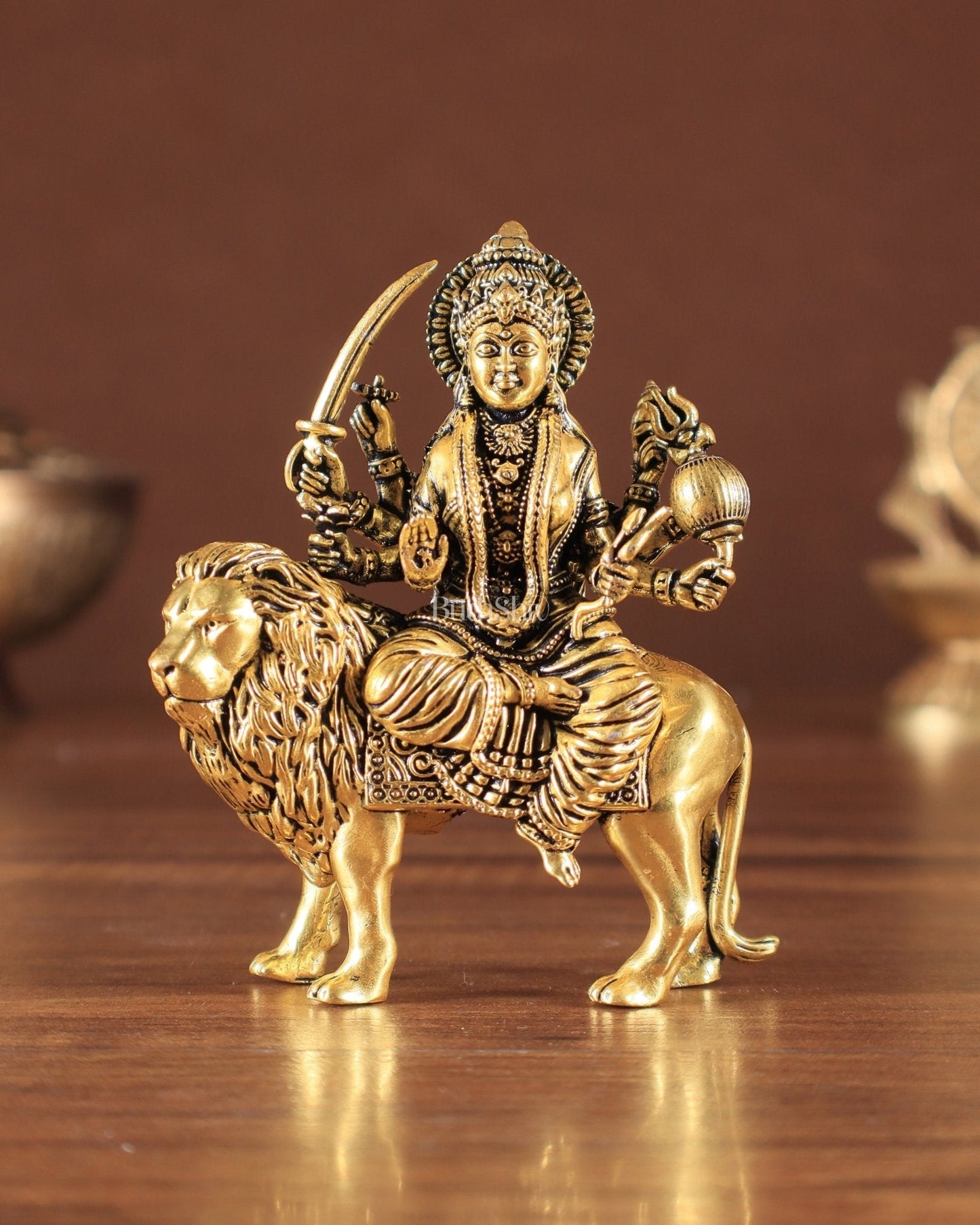 Pure Brass Superfine Durga on Lion Idol golden tone - Sama Homes Idol - Brass Sculpture