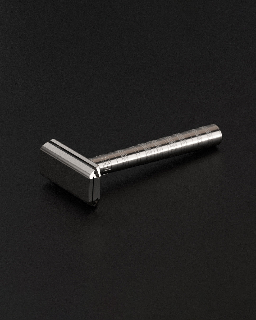 Silver safety razor on a black background - Image 4