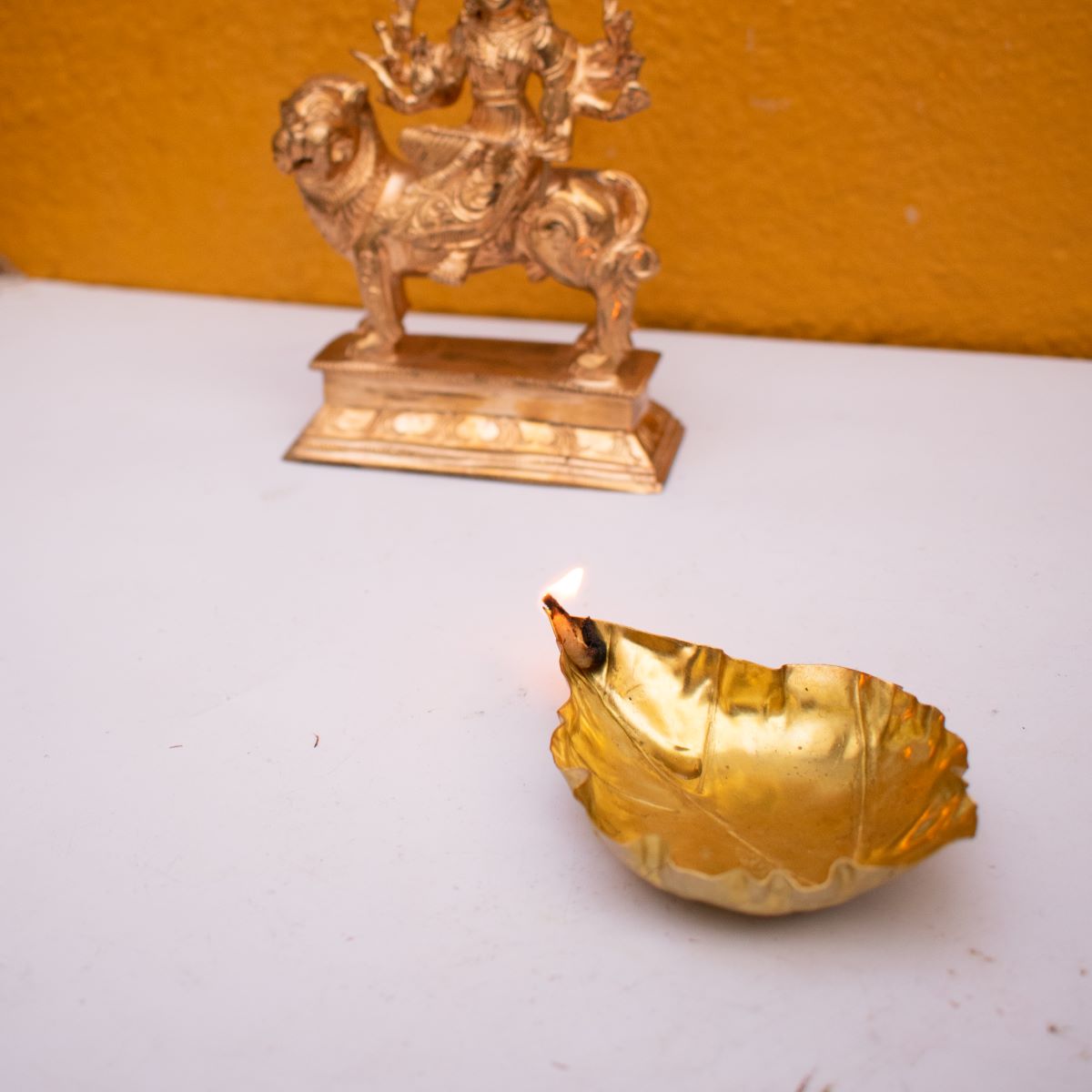 SAMA Homes - hand crafted brass floating peepal leaf shaped diyas