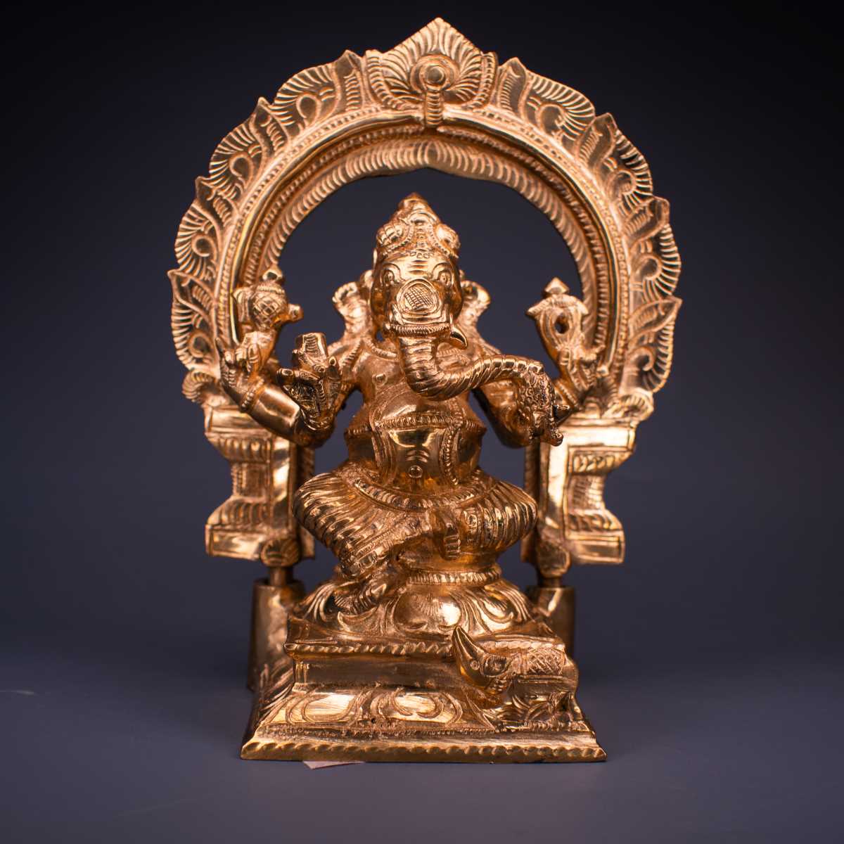 SAMA Homes - ganesha with arch panchaloha idol 6 inches