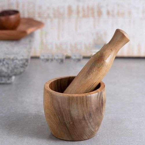 SAMA Homes - hand crafted wooden morter pestle